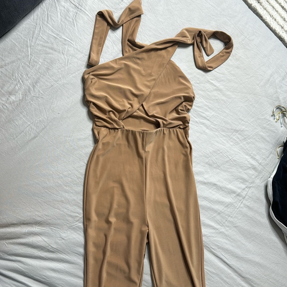 Halter jumpsuit with a high rise pant cut off.